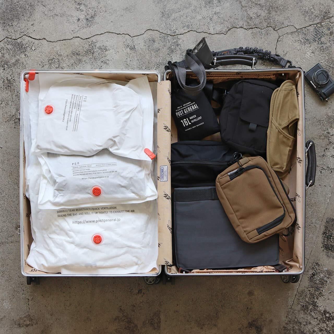 TRAVEL VACUUM PACK LL White