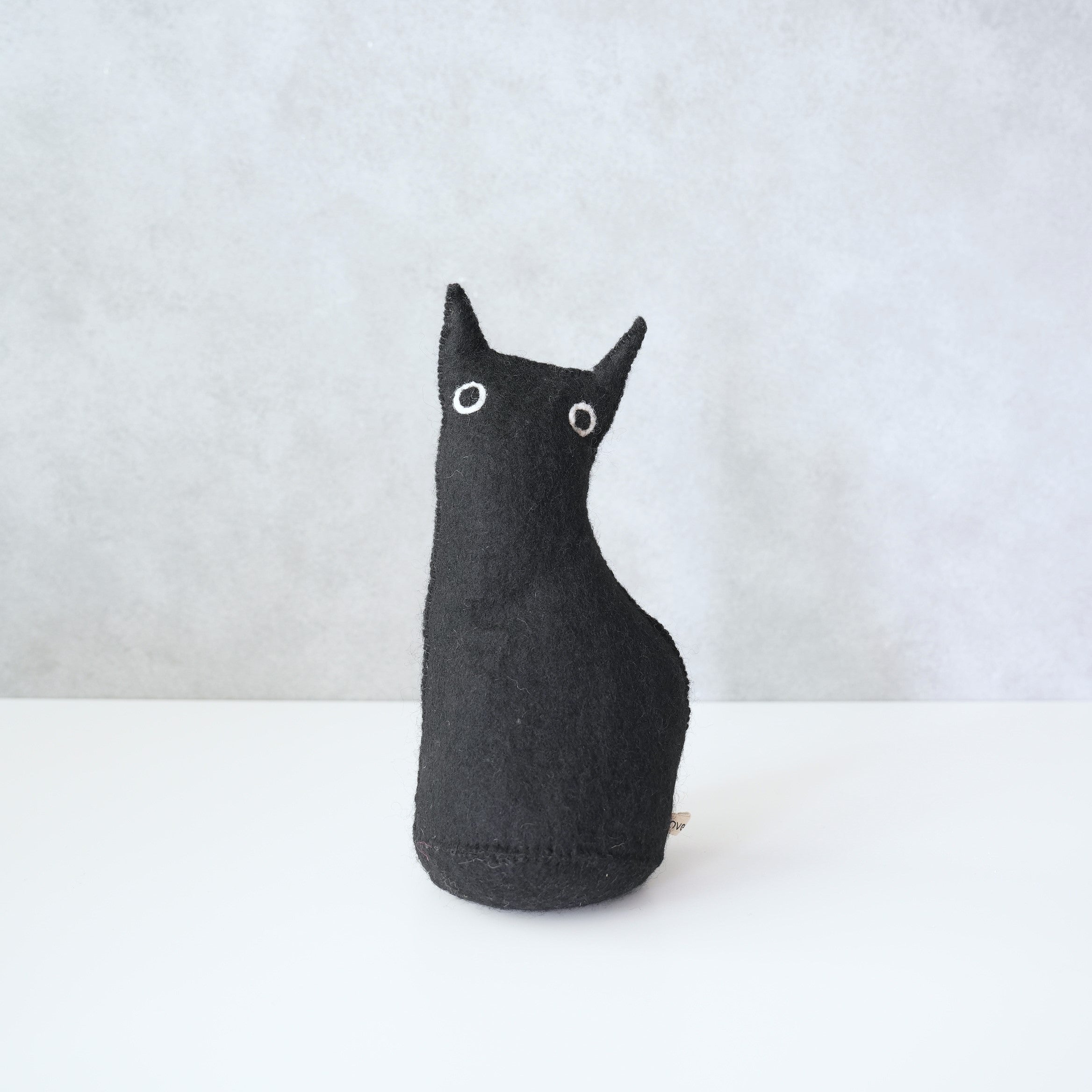 DOOR STOP/BOOKEND THE CURIOUS
