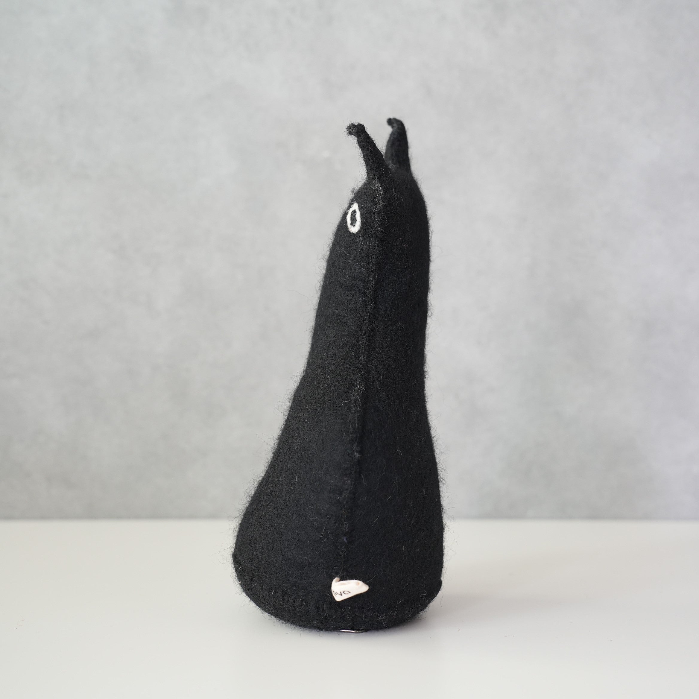 DOOR STOP/BOOKEND THE CURIOUS