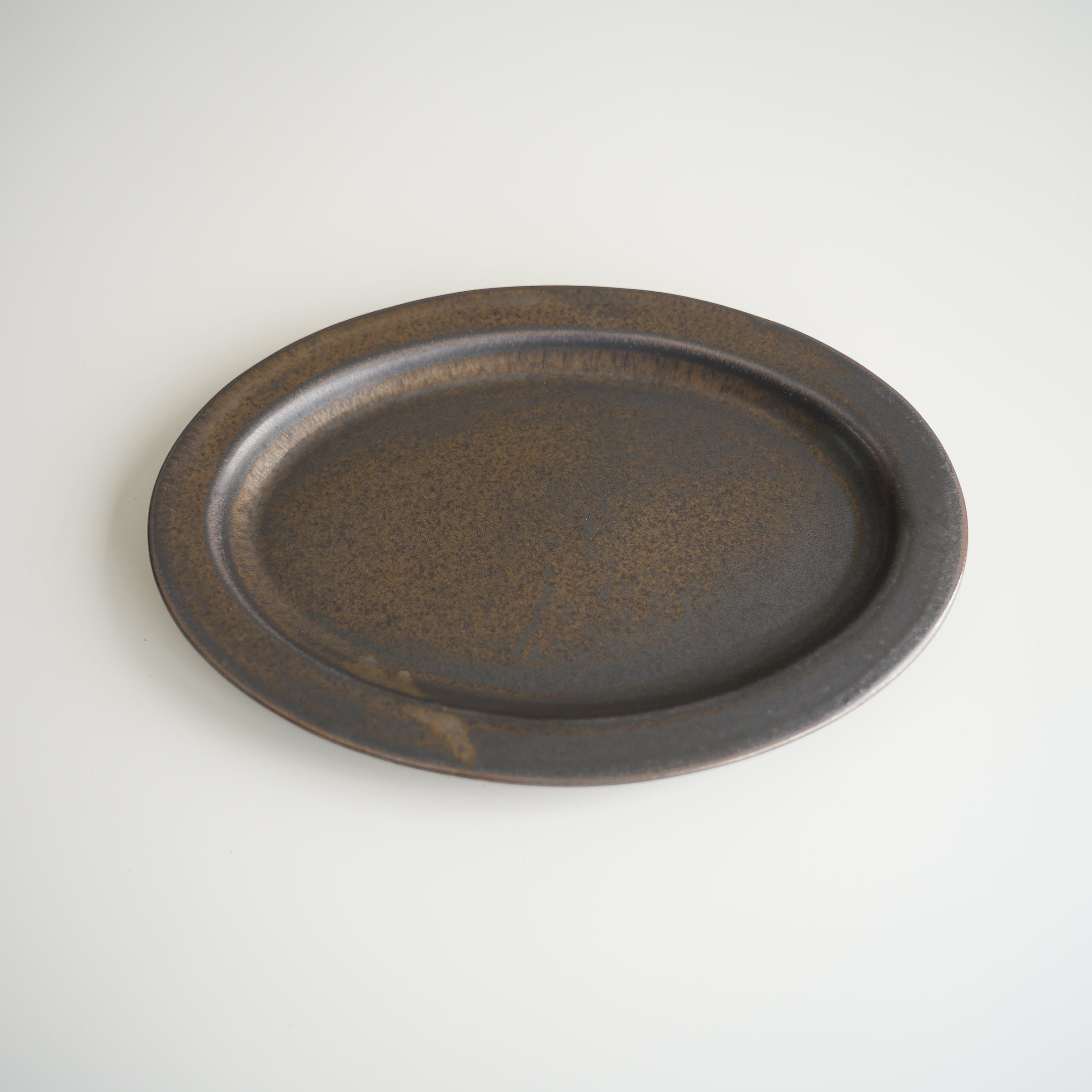 Ancient Pottery Oval Plate Brass