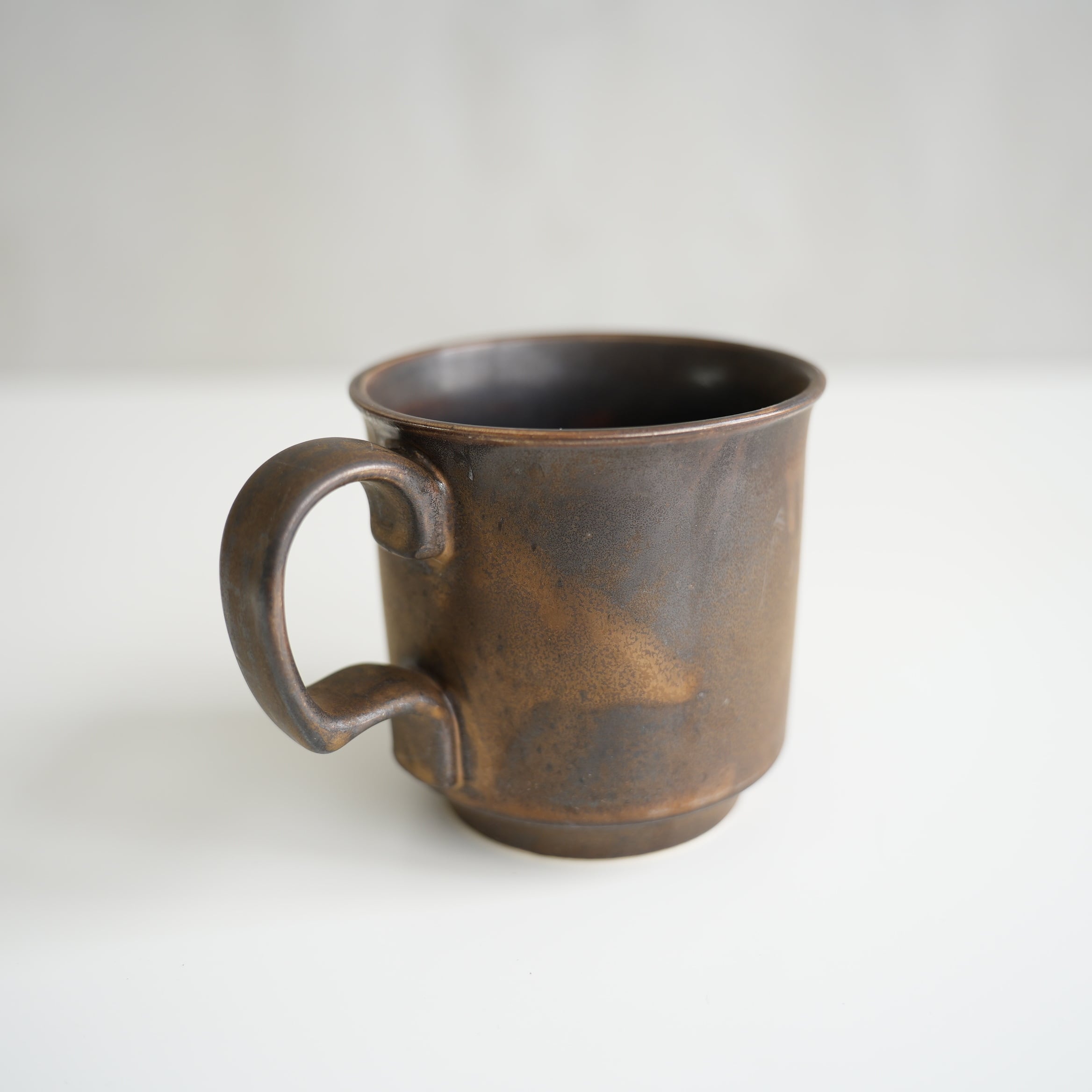 Ancient Pottery Mug Brass