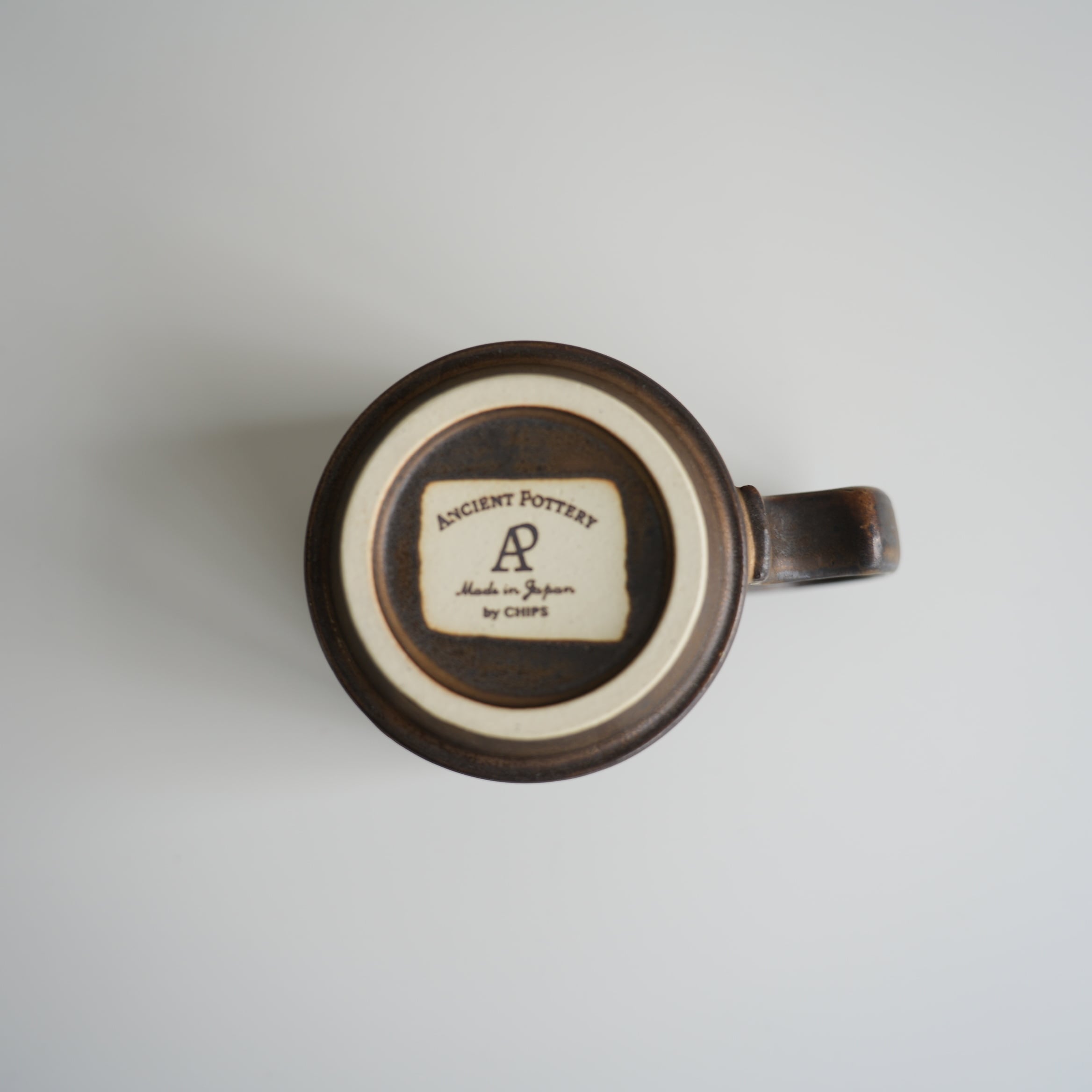 Ancient Pottery Mug Brass